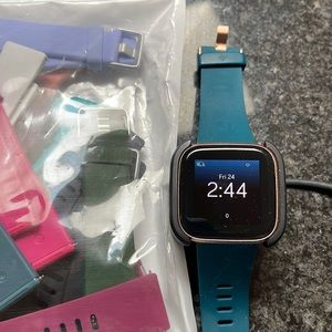 Charge 2 plus cord and 12 bands. Not new but will come with its original box.